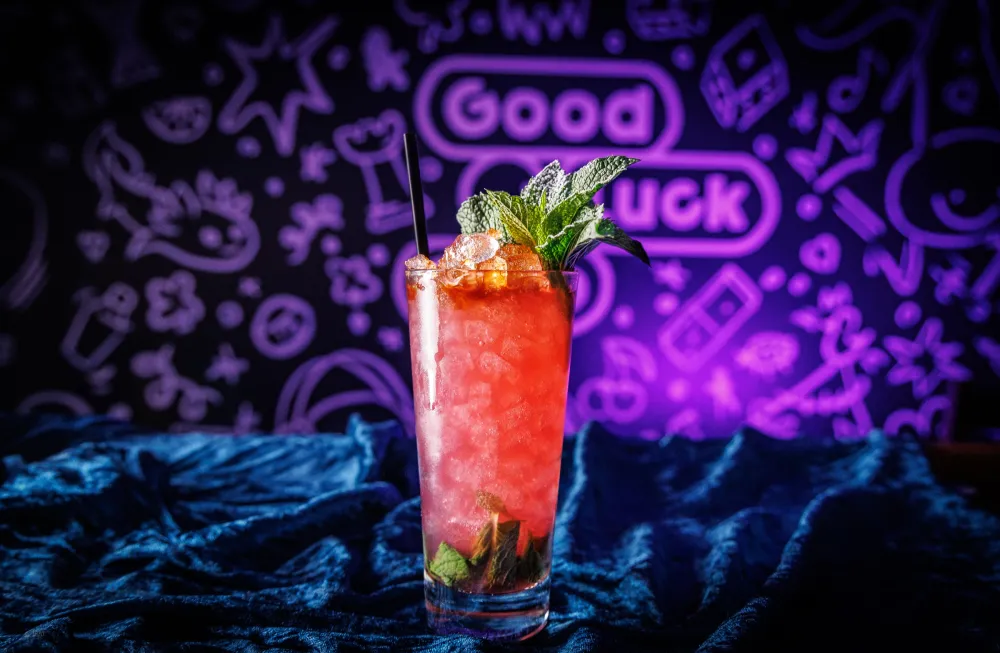 Linkin Park Swizzle, deep red over crushed ice with mint