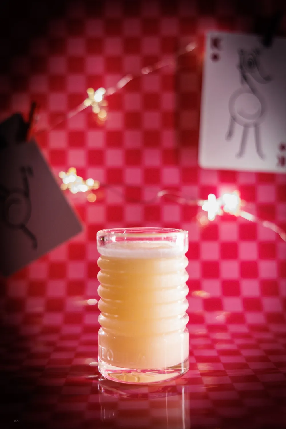 Creamsicle shot on a red checkerboard backdrop